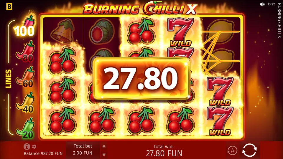 Rodillos de la tragamonedas Burning Chilli X con el Wild Flaming 7 en una combinación ganadora